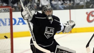 May 14, 2013; Los Angeles, CA, USA; Los Angeles Kings goalie Jonathan Quick (32) makes a save in the second period of game one of the second round of the 2013 Stanley Cup Playoffs against the San Jose Sharks at Staples Center. Mandatory Credit: Jayne Kamin-Oncea-USA TODAY Sports
