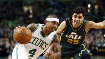 Feb 29, 2016; Boston, MA, USA; Boston Celtics guard Isaiah Thomas (4) drives to the basket against Utah Jazz guard Raul Neto (25) during the first half at TD Garden. Mandatory Credit: Mark L. Baer-USA TODAY Sports