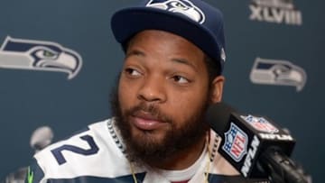 Jan 30, 2014; Jersey City, NJ, USA; Seattle Seahawks defensive end Michael Bennett (72) at a press conference at The Westin in advance of Super Bowl XLVIII. Mandatory Credit: Kirby Lee-USA TODAY Sports