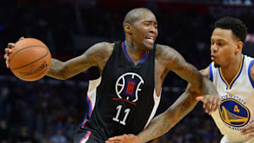 Feb 20, 2016; Los Angeles, CA, USA; Golden State Warriors forward Brandon Rush (4) guards Los Angeles Clippers guard Jamal Crawford (11) in the second half of the game at Staples Center. The Warriors won 115-112. Mandatory Credit: Jayne Kamin-Oncea-USA TODAY Sports