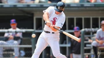 Jul 4, 2015; Chicago, IL, USA; Chicago White Sox third baseman Conor Gillaspie (12) hits a double during the fourth inning against the Baltimore Orioles at U.S Cellular Field. Mandatory Credit: Dennis Wierzbicki-USA TODAY Sports