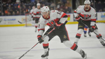 BRIDGEPORT, CT - MARCH 23: Jack Rodewald #12 of the Belleville Senators brings the puck up ice during a game against the Bridgeport Sound Tigers at Webster Bank Arena on March 23, 2019 in Bridgeport, Connecticut. (Photo by Gregory Vasil/Getty Images)