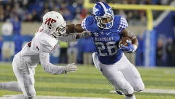 Nov 19, 2016; Lexington, KY, USA; Kentucky Wildcats running back Benny Snell (26) runs the ball against Austin Peay Governors defensive back Trent Taylor (9) in the first half at Commonwealth Stadium. Mandatory Credit: Mark Zerof-USA TODAY Sports