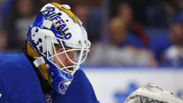 Apr 8, 2023; Buffalo, New York, USA; Buffalo Sabres goaltender Devon Levi (27) looks for the puck during the first period against the Carolina Hurricanes at KeyBank Center. Mandatory Credit: Timothy T. Ludwig-USA TODAY Sports