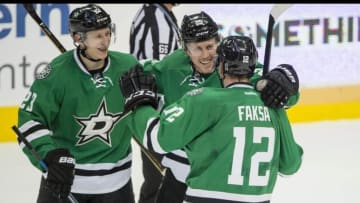 Nov 25, 2016; Dallas, TX, USA; Dallas Stars defenseman Esa Lindell (23) and right wing Brett Ritchie (25) and center Radek Faksa (12) celebrate Faksa