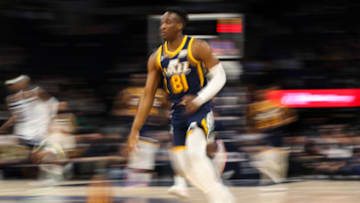 MINNEAPOLIS, MN - DECEMBER 8: Miye Oni #81 of the Utah Jazz dribbles the ball against the Minnesota Timberwolves in the fourth quarter at Target Center on December 8, 2021 in Minneapolis, Minnesota. The Jazz defeated the Timberwolves 136-104. NOTE TO USER: User expressly acknowledges and agrees that, by downloading and or using this Photograph, user is consenting to the terms and conditions of the Getty Images License Agreement. (Photo by David Berding/Getty Images)