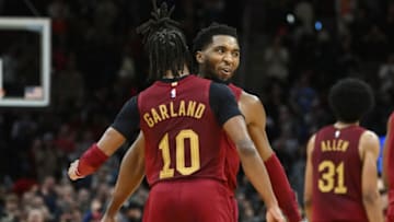 Dec 16, 2022; Cleveland, Ohio, USA; Cleveland Cavaliers guard Darius Garland (10) celebrates with guard Donovan Mitchell (45) during the second half against the Indiana Pacers at Rocket Mortgage FieldHouse. Mandatory Credit: Ken Blaze-USA TODAY Sports
