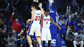 Nov 17, 2015; Auburn Hills, MI, USA; Detroit Pistons forward Ersan Ilyasova (23) high fives Detroit Pistons guard Kentavious Caldwell-Pope (5) during the fourth quarter at The Palace of Auburn Hills. Detroit won 104-99. Mandatory Credit: Tim Fuller-USA TODAY Sports