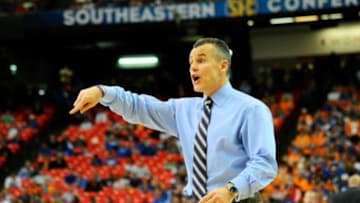 Mar 15, 2014; Atlanta, GA, USA; Florida Gators head coach Billy Donovan reacts against the Tennessee Volunteers during the second half in the semifinals of the SEC college basketball tournament at Georgia Dome. Florida defeated Tennessee 56-49. Mandatory Credit: Dale Zanine-USA TODAY Sports