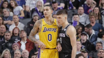 SACRAMENTO, CA - DECEMBER 27: Kyle Kuzma #0 of the Los Angeles Lakers faces off against Bogdan Bogdanovic #8 of the Sacramento Kings on December 27, 2018 at Golden 1 Center in Sacramento, California. NOTE TO USER: User expressly acknowledges and agrees that, by downloading and or using this photograph, User is consenting to the terms and conditions of the Getty Images Agreement. Mandatory Copyright Notice: Copyright 2018 NBAE (Photo by Rocky Widner/NBAE via Getty Images)