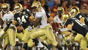ORLANDO, FL - DECEMBER 29: Safety Lamarcus Joyner #20 of the Florida State Seminoles returns a punt 77 yards against the Notre Dame Fight Irish December 29, 2011 at the Florida Citrus Bowl in Orlando, Florida. FSU won 18 - 14. (Photo by Al Messerschmidt/Getty Images)