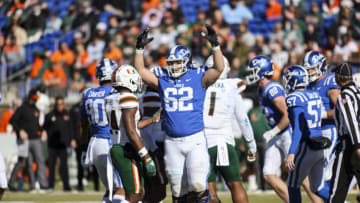 Nov 27, 2021; Durham, North Carolina, USA; Duke Blue Devils offensive tackle Graham Barton (62) celebrates a point during the first half of the game against the Miami Hurricanes at Wallace Wade Stadium. at Wallace Wade Stadium. Mandatory Credit: Jaylynn Nash-USA TODAY Sports