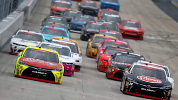 DOVER, DE - OCTOBER 06: Christopher Bell, driver of the #20 Rheem Toyota, and Brandon Jones, driver of the #19 Menards/Atlas Toyota, lead the field during the NASCAR Xfinity Series Bar Harbor 200 presented by Sea Watch International at Dover International Speedway on October 6, 2018 in Dover, Delaware. (Photo by Jonathan Ferrey/Getty Images)