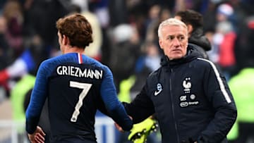 France's coach Didier Deschamps (R) shakes hands with France's forward Antoine Griezmann as he leaves the pitch during the friendly football match France vs Uruguay, on November 20, 2018 at the Stade de France in Saint-Denis, outside Paris. (Photo by FRANCK FIFE / AFP) (Photo credit should read FRANCK FIFE/AFP via Getty Images)