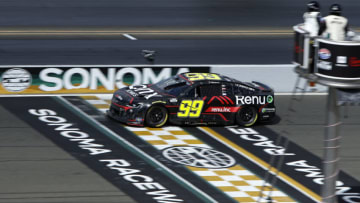 SONOMA, CALIFORNIA - JUNE 12: Daniel Suarez, driver of the #99 Onx Homes/Renu Chevrolet, crosses the finish line to win the NASCAR Cup Series Toyota/Save Mart 350 at Sonoma Raceway on June 12, 2022 in Sonoma, California. (Photo by Sean Gardner/Getty Images)