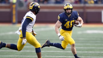 Apr 13, 2019; Ann Arbor, MI, USA; Michigan Wolverines fullback Ben VanSumeren (40) runs the ball during the spring football game at Michigan Stadium. Mandatory Credit: Raj Mehta-USA TODAY Sports