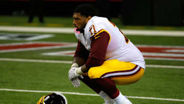 ATLANTA, GA - OCTOBER 11: Trent Williams #71 of the Washington Redskins reacts after Robert Alford #23 of the Atlanta Falcons returned an interception for a touchdown in their 25-19 loss at Georgia Dome on October 11, 2015 in Atlanta, Georgia. (Photo by Kevin C. Cox/Getty Images)