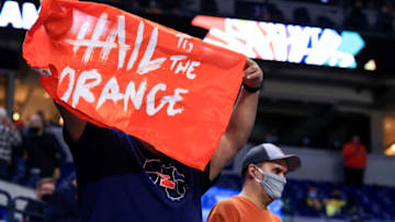 Mar 12, 2021; Indianapolis, Indiana, USA; A fan of the Illinois Fighting Illini waves a flag in support as they celebrate defeating the Rutgers Scarlet Knights at Lucas Oil Stadium. Mandatory Credit: Aaron Doster-USA TODAY Sports