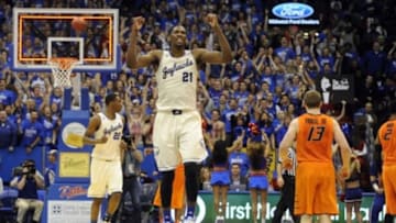 Jan 18, 2014; Lawrence, KS, USA; Kansas Jayhawks center Joel Embiid (21) celebrates after the game against the Oklahoma State Cowboys at Allen Fieldhouse. Kansas won 80-78. Mandatory Credit: John Rieger-USA TODAY Sports
