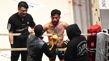 SAITAMA, JAPAN - DECEMBER 29: A bloody Ian McCall of the United States shows dejection in the bantam weight bout during the RIZIN Fighting World Grand-Prix 2017 2nd Round at Saitama Super Arena on December 29, 2017 in Saitama, Japan. (Photo by Etsuo Hara/Getty Images)