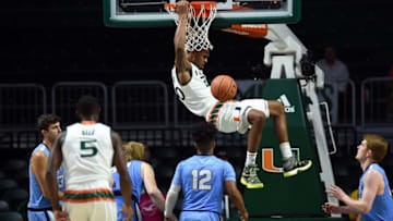 Dec 28, 2016; Coral Gables, FL, USA; Miami Hurricanes forward Dewan Huell (20) dunks the ball as Columbia Lions guard Mike Smith (12) looks on during the first half at Watsco Center. Mandatory Credit: Steve Mitchell-USA TODAY Sports
