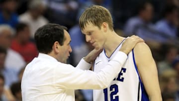 Duke basketball head coach Mike Krzyzewski and forward Kyle Singler (Photo by Streeter Lecka/Getty Images)