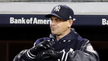 NEW YORK, NY - APRIL 24: Manager Aaron Boone #17 of the New York Yankees watches his team from the dugout in an MLB baseball game against the Minnesota Twins on April 24, 2018 at Yankee Stadium in the Bronx borough of New York City. Yankees won 8-3. (Photo by Paul Bereswill/Getty Images)