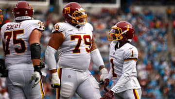 CHARLOTTE, NORTH CAROLINA - NOVEMBER 21: DeAndre Carter #1 of the Washington Football Team celebrates a 4 yard touchdown reception with teammate Ereck Flowers #79 during the third quarter of their game against the Carolina Panthers at Bank of America Stadium on November 21, 2021 in Charlotte, North Carolina. (Photo by Jared C. Tilton/Getty Images)