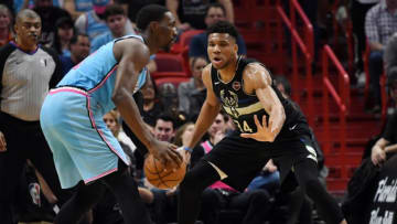Milwaukee Bucks forward Giannis Antetokounmpo (34) defends Miami Heat forward Bam Adebayo (13) (Jim Rassol-USA TODAY Sports)