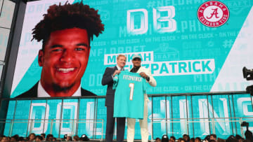 ARLINGTON, TX - APRIL 26: Minkah Fitzpatrick of Alabama poses with NFL Commissioner Roger Goodell after being picked #11 overall by the Miami Dolphins during the first round of the 2018 NFL Draft at AT&T Stadium on April 26, 2018 in Arlington, Texas. (Photo by Tom Pennington/Getty Images)