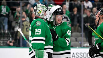Mar 1, 2023; Dallas, Texas, USA; Dallas Stars goaltender Jake Oettinger (29) and left wing Fredrik Olofsson (42) celebrate after the Stars victory over the Arizona Coyotes at the American Airlines Center. Mandatory Credit: Jerome Miron-USA TODAY Sports
