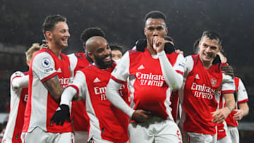 LONDON, ENGLAND - DECEMBER 11: Gabriel Magalhaes of Arsenal celebrates with teammates Ben White, Alexandre Lacazette and Granit Xhaka after scoring their side's third goal during the Premier League match between Arsenal and Southampton at Emirates Stadium on December 11, 2021 in London, England. (Photo by Justin Setterfield/Getty Images)