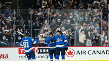 Winnipeg Jets, Tucker Poolman (3), Kyle Connor (81), Andrew Copp (9) Mandatory Credit: Terrence Lee-USA TODAY Sports