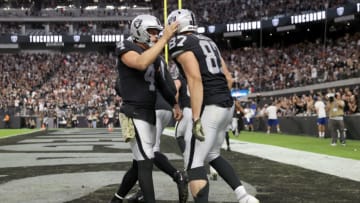 LAS VEGAS, NEVADA - NOVEMBER 21: Derek Carr #4 of the Las Vegas Raiders congratulates Foster Moreau #87 for a touchdown against the Cincinnati Bengals at Allegiant Stadium on November 21, 2021 in Las Vegas, Nevada. (Photo by Matthew Stockman/Getty Images)