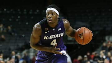 Nov 26, 2016; Brooklyn, NY, USA; Kansas State Wildcats forward D.J. Johnson (4) with then all against the Maryland Terrapins during the second half of the championship game of the Barclays Center Classic at Barclays Center. Maryland won 69-68. Mandatory Credit: Vincent Carchietta-USA TODAY Sports