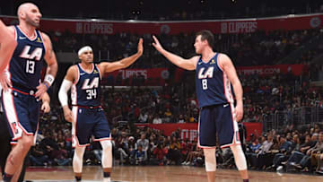 LOS ANGELES, CA - DECEMBER 22: Tobias Harris #34 and Danilo Gallinari #8 of the LA Clippers high-five during a game against the Denver Nuggets on December 22, 2018 at STAPLES Center in Los Angeles, California. NOTE TO USER: User expressly acknowledges and agrees that, by downloading and/or using this Photograph, user is consenting to the terms and conditions of the Getty Images License Agreement. Mandatory Copyright Notice: Copyright 2018 NBAE (Photo by Adam Pantozzi/NBAE via Getty Images)