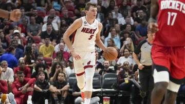Nikola Jovic #5 of the Miami Heat brings the basketball upcourt during the second half against the Houston Rockets(Photo by Eric Espada/Getty Images)