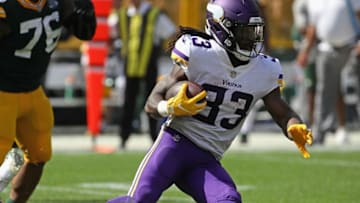 GREEN BAY, WI - SEPTEMBER 16: Dalvin Cook #33 of the Minnesota Vikings runs against the Green Bay Packers at Lambeau Field on September 16, 2018 in Green Bay, Wisconsin. The Vikings and the Packers tied 29-29 after overtime. (Photo by Jonathan Daniel/Getty Images)