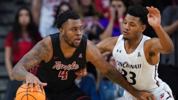 Temple Owls center Jamille Reynolds posts up Cincinnati Bearcats forward Ody Oguama at Fifth Third Arena. Getty Images.