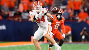 Oct 15, 2021; Syracuse, New York, USA; Clemson Tigers tight end Davis Allen (84) attempts to catch a pass as Syracuse Orange defensive back Garrett Williams (8) defends during the first half at the Carrier Dome. The pass would fall incomplete. Mandatory Credit: Rich Barnes-USA TODAY Sports