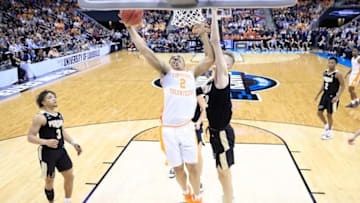 LOUISVILLE, KENTUCKY - MARCH 28: Grant Williams #2 of the Tennessee Volunteers shoots over Matt Haarms #32 of the Purdue Boilermakers during overtime of the 2019 NCAA Men's Basketball Tournament South Regional at the KFC YUM! Center on March 28, 2019 in Louisville, Kentucky. (Photo by Andy Lyons/Getty Images)