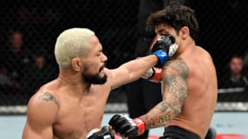 EDMONTON, ALBERTA - JULY 27: (L-R) Deiveson Figueiredo of Brazil punches Alexandre Pantoja of Brazil in their flyweight bout during the UFC 240 event at Rogers Place on July 27, 2019 in Edmonton, Alberta, Canada. (Photo by Jeff Bottari/Zuffa LLC/Zuffa LLC)