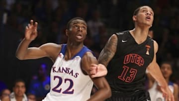 Nov 30, 2013; Paradise Island, BAHAMAS; Kansas Jayhawks guard Andrew Wiggins (22) battles with UTEP Miners guard McKenzie Moore (13) for position during the game at the 2013 Battle 4 Atlantis in the Imperial Arena at the Atlantis Resort. Mandatory Credit: Kevin Jairaj-USA TODAY Sports