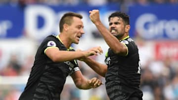 SWANSEA, WALES - SEPTEMBER 11: Diego Costa of Chelsea (R) celebrates with team mate John Terry as he scores their second goal during the Premier League match between Swansea City and Chelsea at Liberty Stadium on September 11, 2016 in Swansea, Wales. (Photo by Darren Walsh/Chelsea FC via Getty Images)
