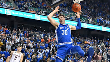 GREENSBORO, NORTH CAROLINA - MARCH 11: Kyle Filipowski #30 of the Duke Blue Devils reacts after a sunk Virginia Cavaliers in the second half of the ACC Basketball Tournament Championship game at Greensboro Coliseum on March 11, 2023 in Greensboro, North Carolina. Duke won 59-49. (Photo by Grant Halverson/Getty Images)