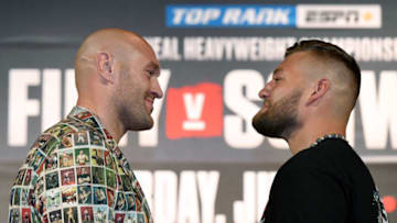 LAS VEGAS, NEVADA - JUNE 12: Boxers Tyson Fury (L) and Tom Schwarz face off during a news conference at MGM Grand Hotel & Casino on June 12, 2019 in Las Vegas, Nevada. The two will meet in a heavyweight bout on June 15 at MGM Grand Garden Arena in Las Vegas. (Photo by Ethan Miller/Getty Images)