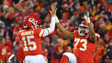 KANSAS CITY, MO - DECEMBER 30: Quarterback Patrick Mahomes #15 of the Kansas City Chiefs celebrates with offensive tackle Jeff Allen #73, after throwing a touchdown pass against the Oakland Raiders during the second half at Arrowhead Stadium on December 30, 2018 in Kansas City, Missouri. (Photo by Peter G. Aiken/Getty Images)