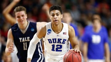 Mar 19, 2016; Providence, RI, USA; Duke Blue Devils guard Derryck Thornton (12) brings the ball up court against the Yale Bulldogs during the first half of a second round game of the 2016 NCAA Tournament at Dunkin Donuts Center. Mandatory Credit: Mark L. Baer-USA TODAY Sports