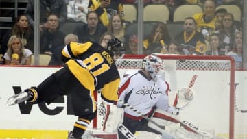 Oct 13, 2016; Pittsburgh, PA, USA; Pittsburgh Penguins right wing Phil Kessel (81) scores the game winning goal against Washington Capitals goalie Braden Holtby (70) in the shootout at the PPG Paints Arena. The Penguins won 3-2 in a shootout. Mandatory Credit: Charles LeClaire-USA TODAY Sports