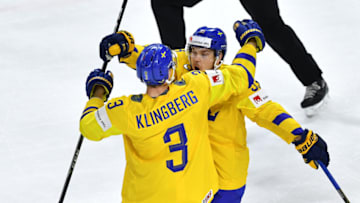 Sweden's Viktor Arvidsson (R) celebrates with teammate Sweden's John Klingberg after scoring during the semifinal match Sweden vs USA of the 2018 IIHF Ice Hockey World Championship at the Royal Arena in Copenhagen, Denmark, on May 19, 2018. (Photo by JOE KLAMAR / AFP) (Photo credit should read JOE KLAMAR/AFP/Getty Images)
